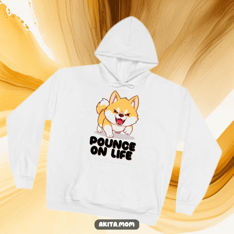 Funny Kawaii Akita hoodie showing a dog playfully pouncing. Fierce yet adorable design for comfort and humor.