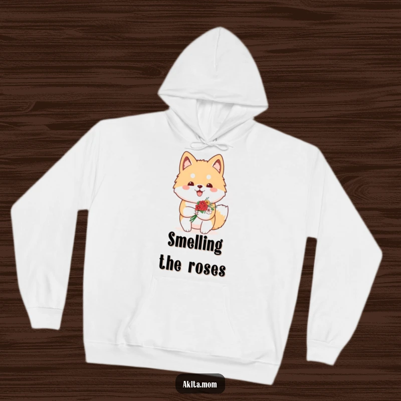 Funny Kawaii Akita hoodie depicting a proud dog carrying a small bouquet of flowers, offering a warm and affectionate visual.