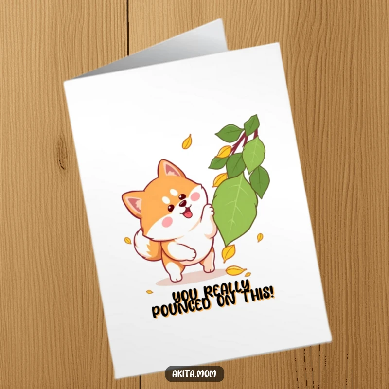 Funny Free Printable Congrats Card: Kawaii Akita playfully pouncing on a falling leaf, celebrating achievements.