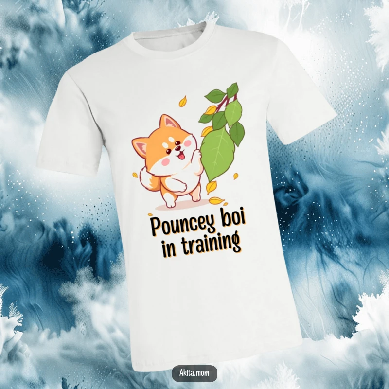 Funny Kawaii Akita t-shirt showing an energetic dog with alert ears playfully pouncing on a colorful falling autumn leaf, a delightful canine moment.