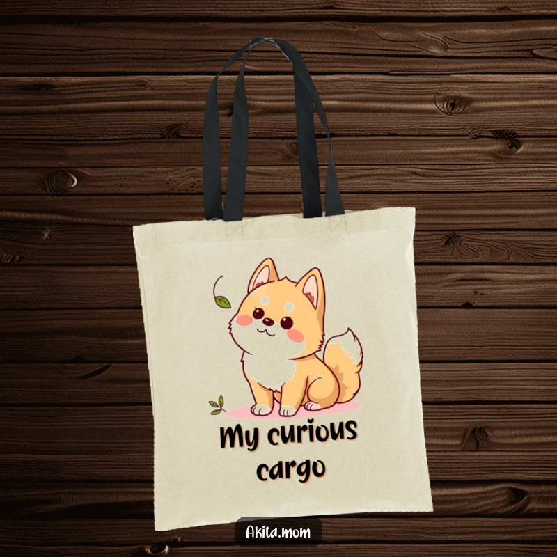 Funny Kawaii Akita tote bag, a curious dog focused on a fluttering leaf, perfect for carrying essentials with charm.